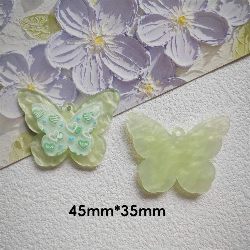 Wholesale 10pcs Water Pattern Double Butterfly Cute Cartoon Hole Pendant Embossed Printing Design Acrylic Jewelry Accessories DIY